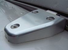 Load image into Gallery viewer, DEFENDER ALUMINIUM BONNET HINGE KIT - COMES AS A PAIR WHICH INCLUDES ALL STAINLESS STEEL FIXINGS
